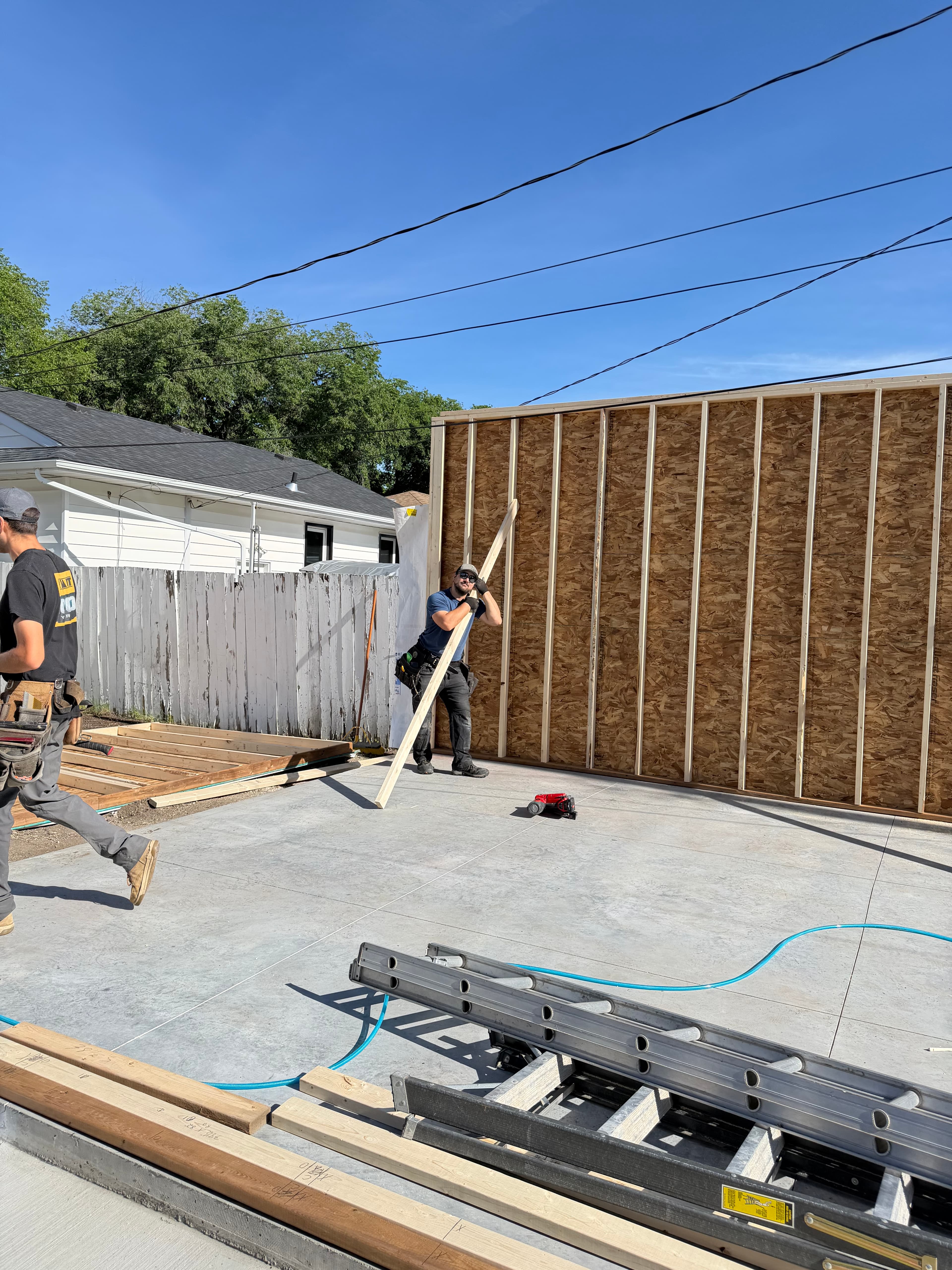 WLG Homes crew setting roof rafters during garage framing in Saskatoon